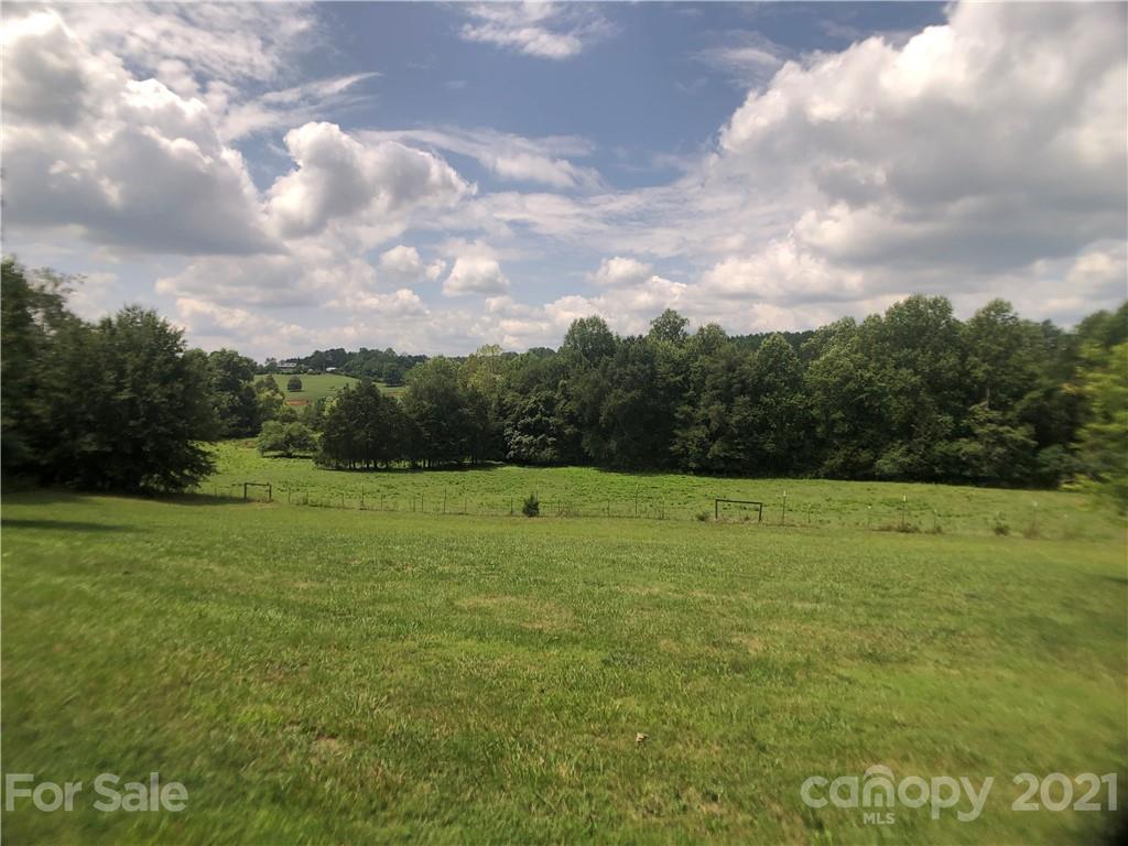 5526 Whiteside Road Bostic, NC 28018 - Photo 2 of 48 a view of outdoor space with field and trees