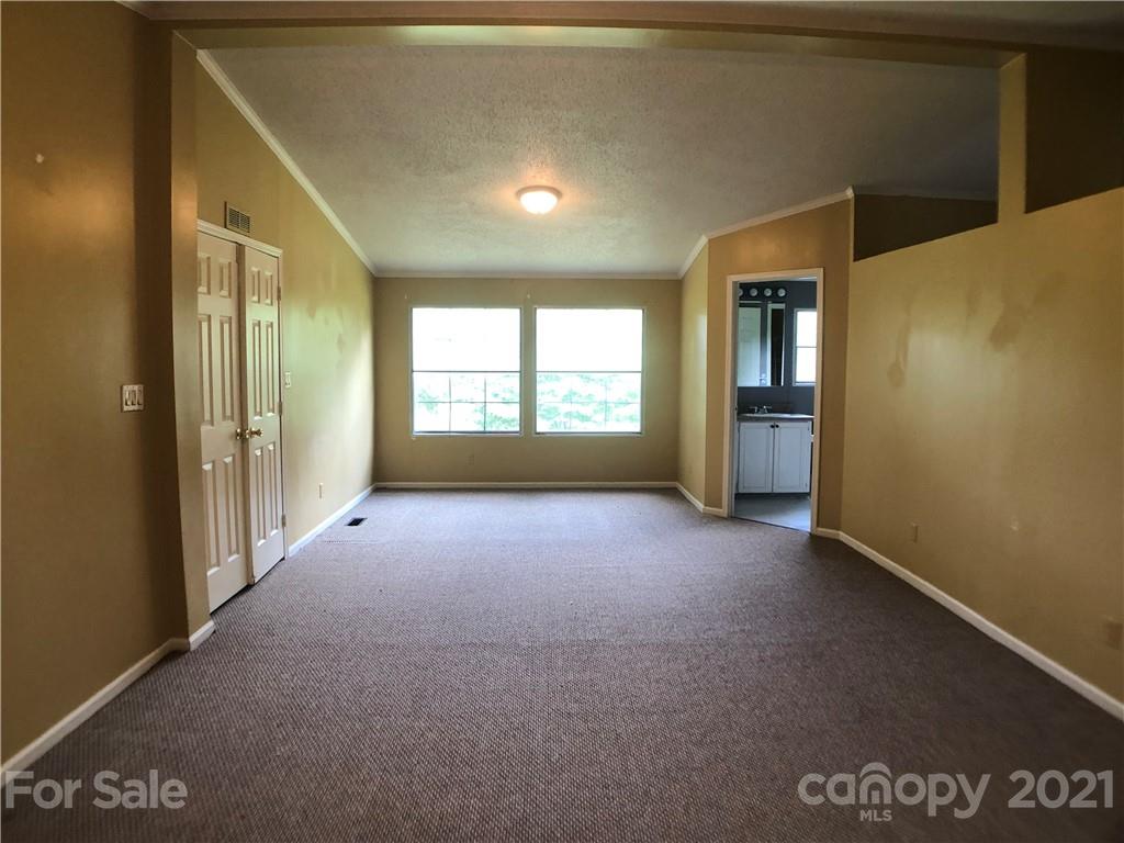 5526 Whiteside Road Bostic, NC 28018 - Photo 12 of 48 a view of hallway with a window