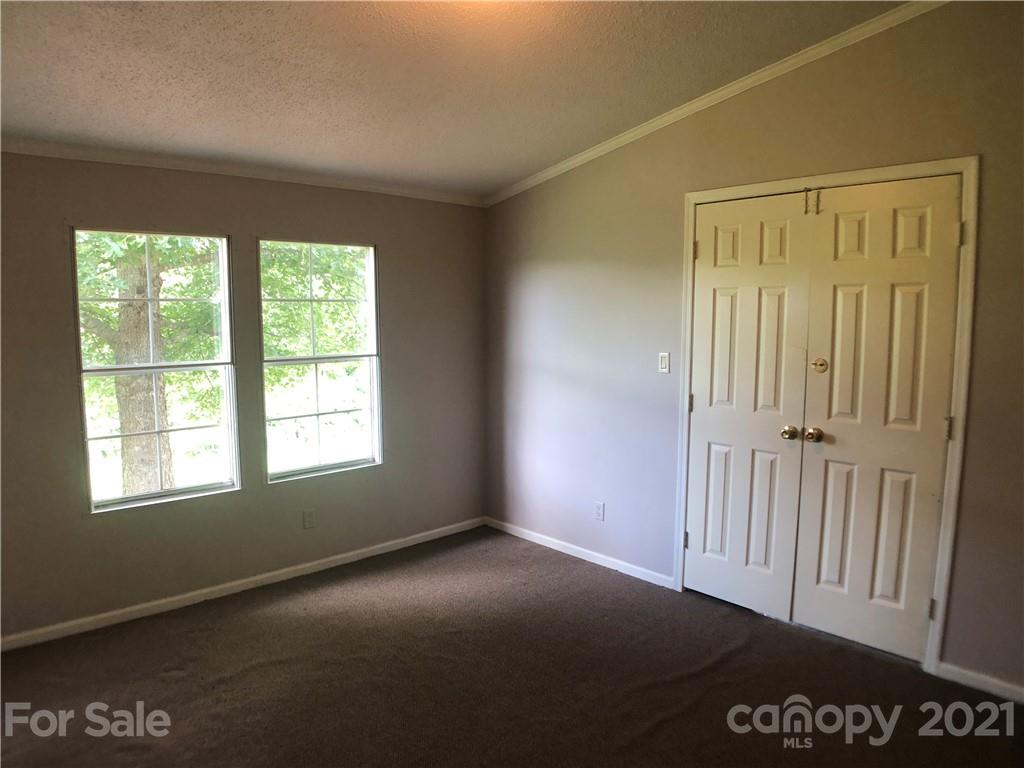 5526 Whiteside Road Bostic, NC 28018 - Photo 19 of 48 an empty room with windows