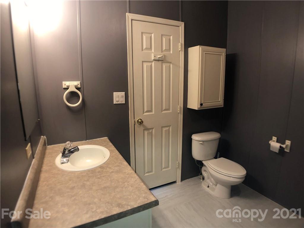 5526 Whiteside Road Bostic, NC 28018 - Photo 26 of 48 a bathroom with a toilet and a sink