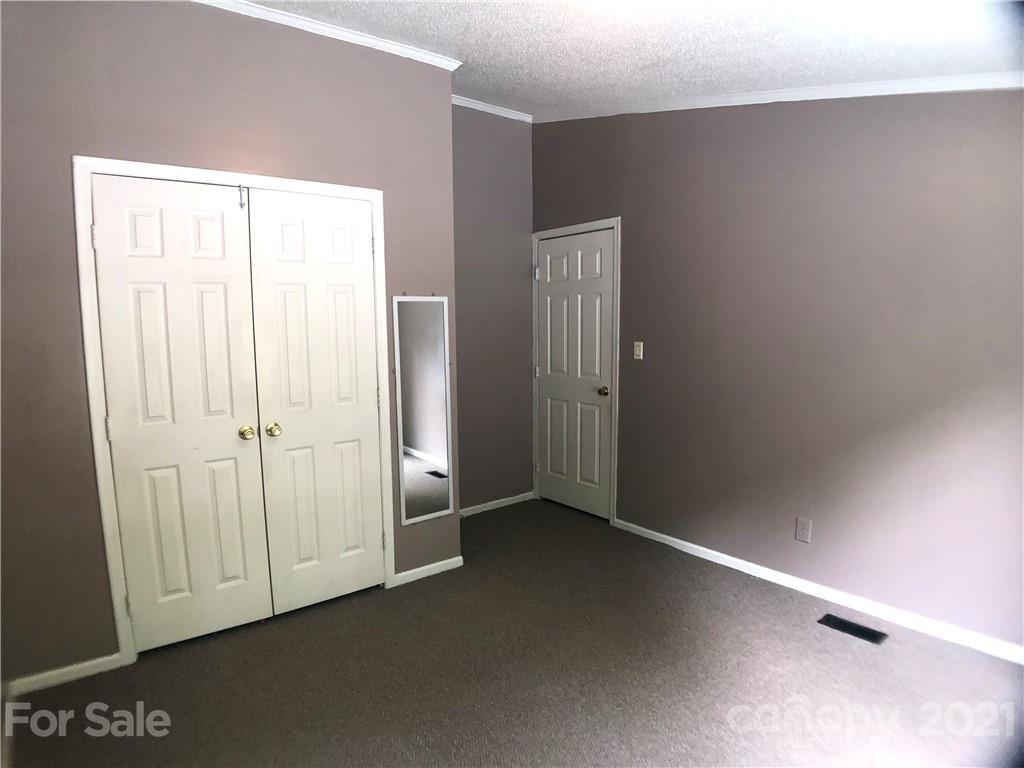 5526 Whiteside Road Bostic, NC 28018 - Photo 33 of 48 an empty room with a door