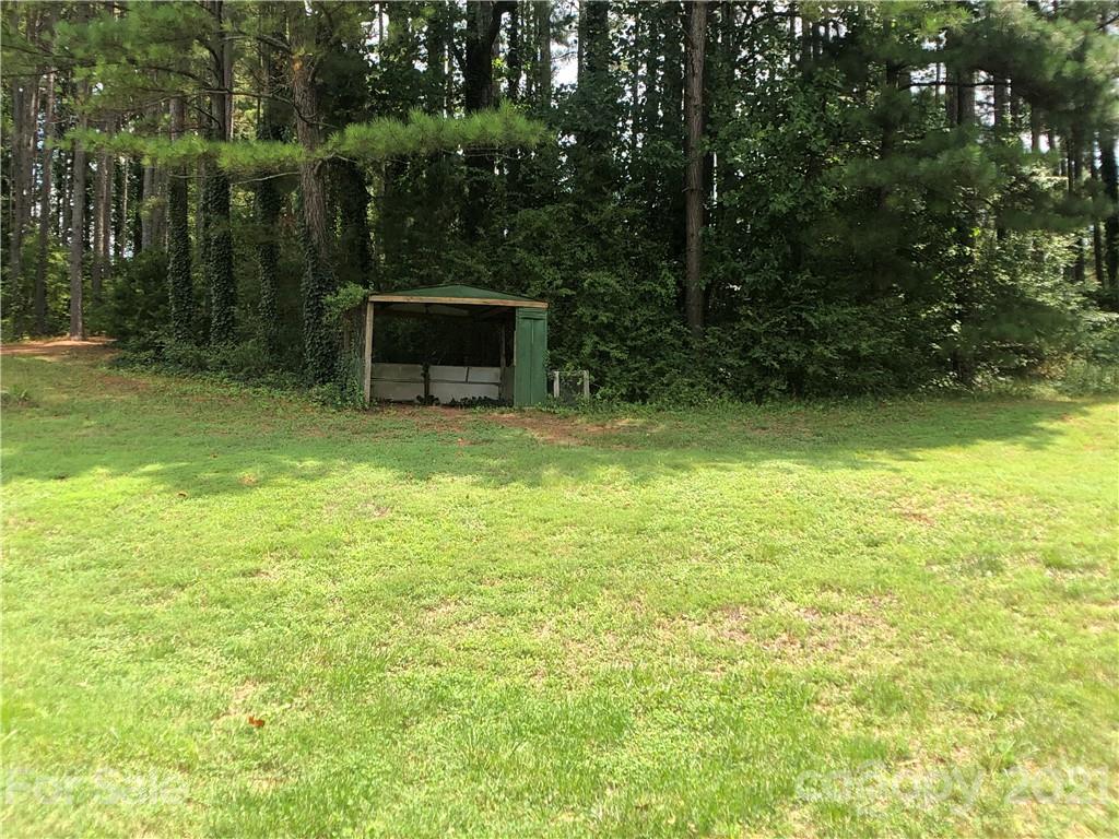 5526 Whiteside Road Bostic, NC 28018 - Photo 42 of 48 a view of a garden with a trees