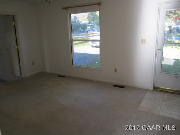 21 Stubblefield Road Waynesboro, VA 22980 - Photo 4 of 6 an empty room with windows