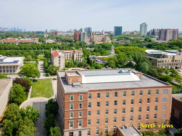 a view of a city with tall buildings