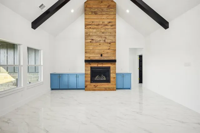 a view of kitchen with furniture and window