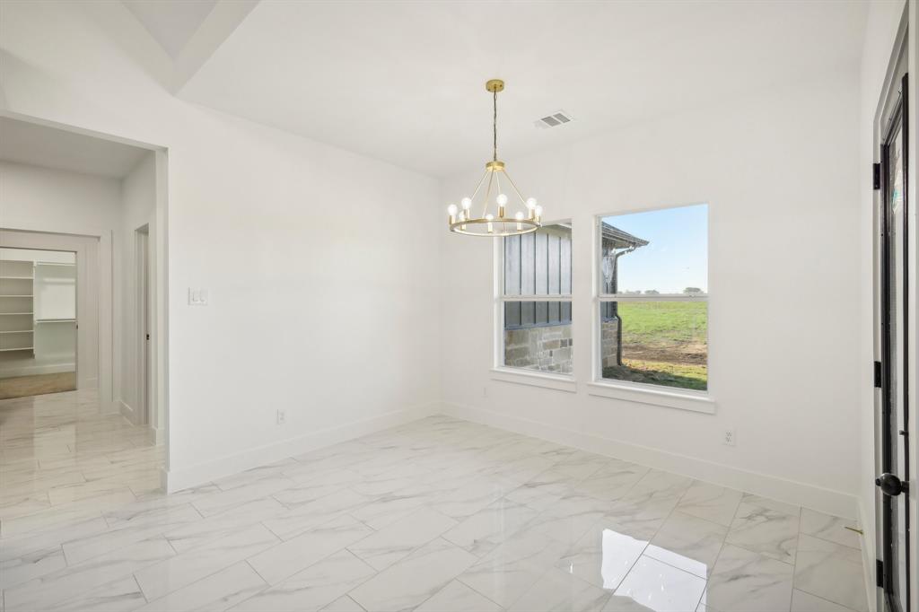 6657 Buffalo Ridge Circle Godley, TX 76044 - Photo 12 of 38 a view of an empty room with a window