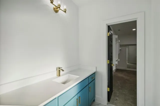 a utility room with cabinets
