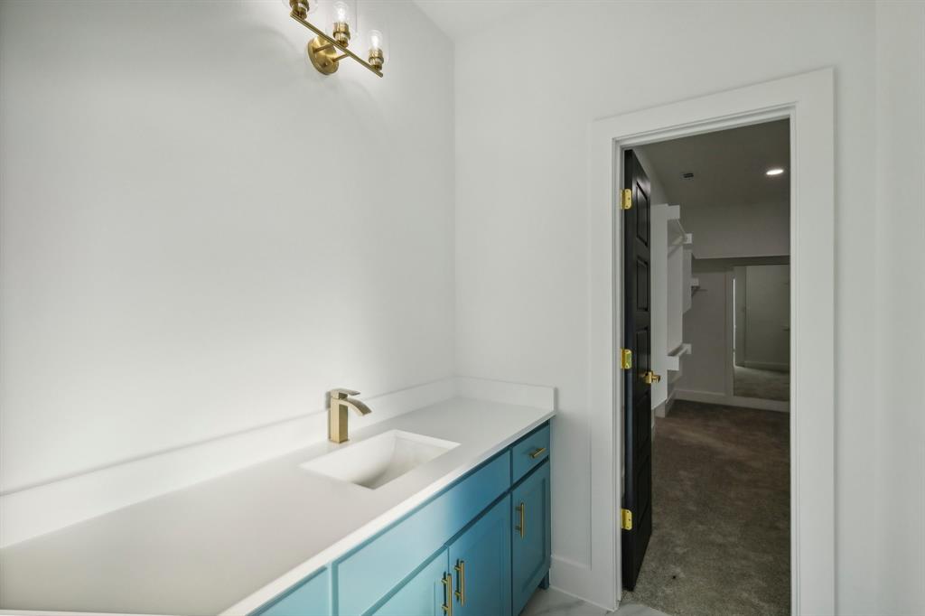 6657 Buffalo Ridge Circle Godley, TX 76044 - Photo 29 of 38 a bathroom with a sink and vanity