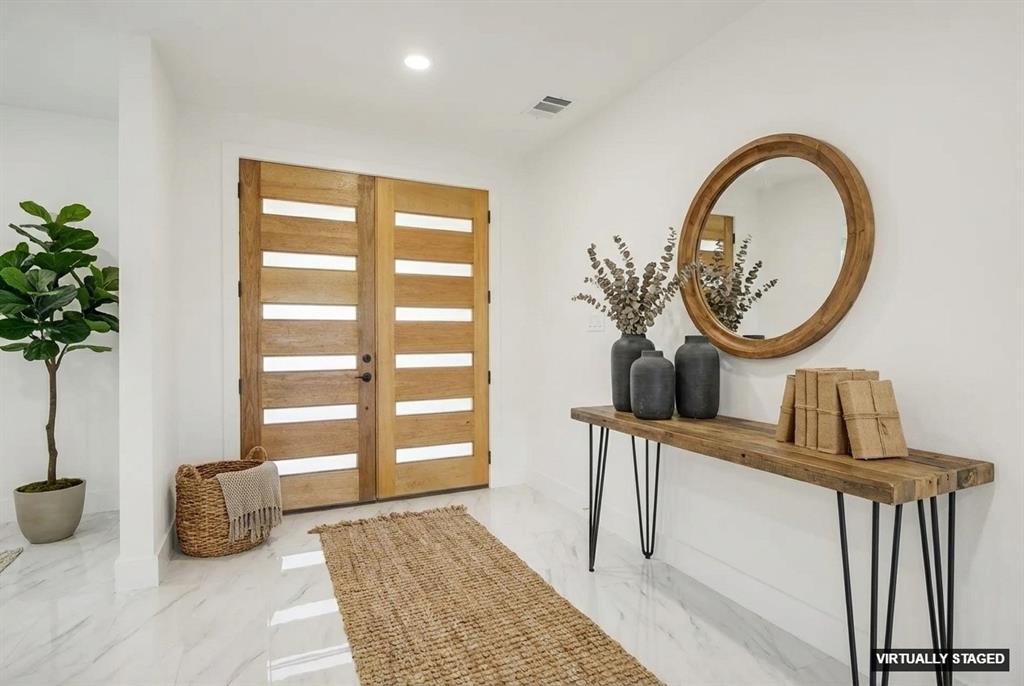 6657 Buffalo Ridge Circle Godley, TX 76044 - Photo 9 of 38 a view of front door with furniture and a potted plant