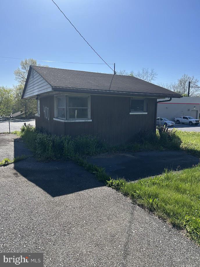 400 East Main Street Mount Joy, PA 17552 - Photo 7 of 15 a front view of a house with garden