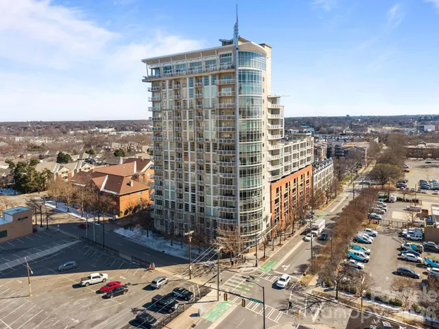 a view of city with tall buildings