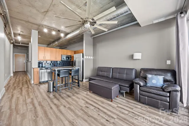 a outdoor space with lots of tables and chairs