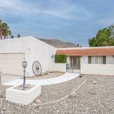 a table and chairs in a patio