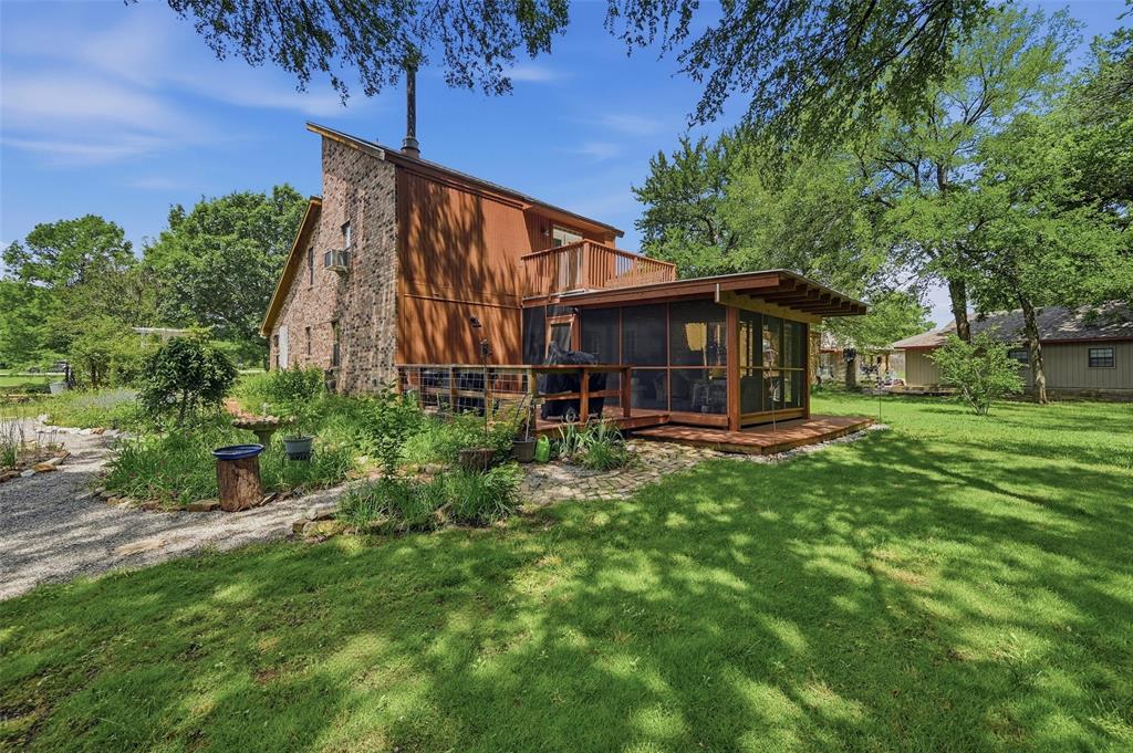 522 High Country Road Sherman, TX 75092 - Photo 28 of 38 a view of a house with a yard