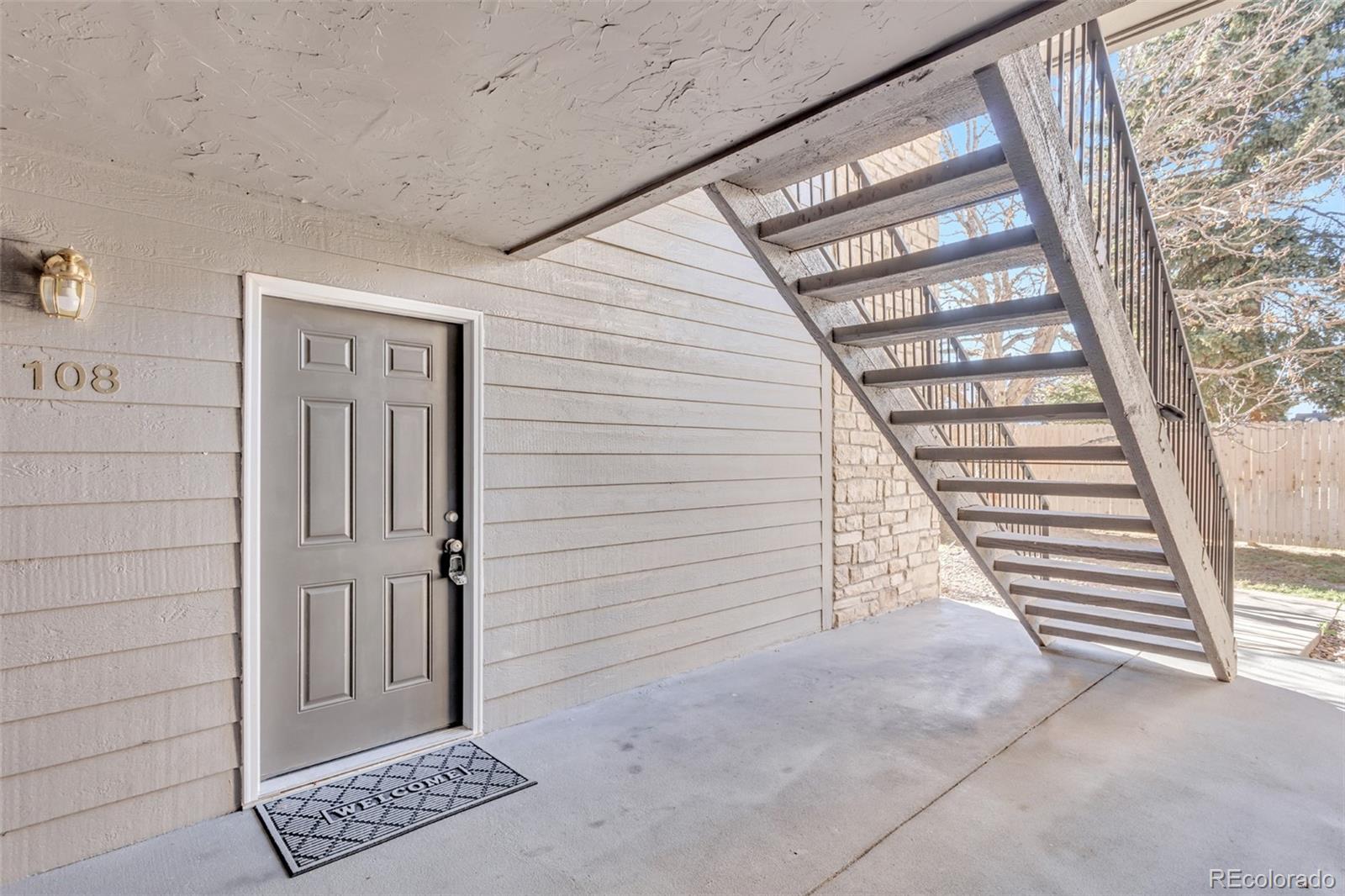 2575 South Syracuse Way, Unit J108 Denver, CO 80231 - Photo 18 of 18 a view of a entryway door of the house