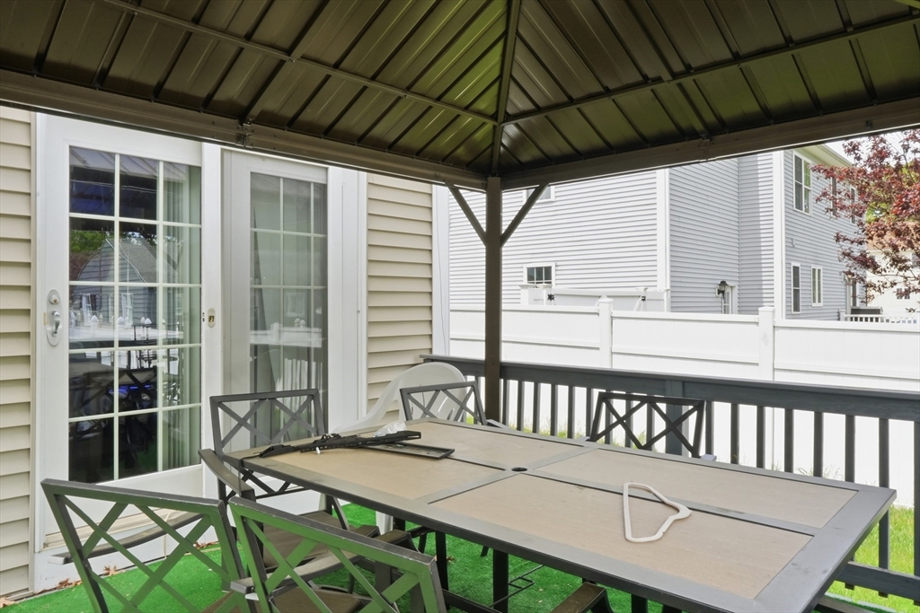 19 Annies Way Springfield, MA 01119 - Photo 36 of 40 a view of a chairs and table in the patio