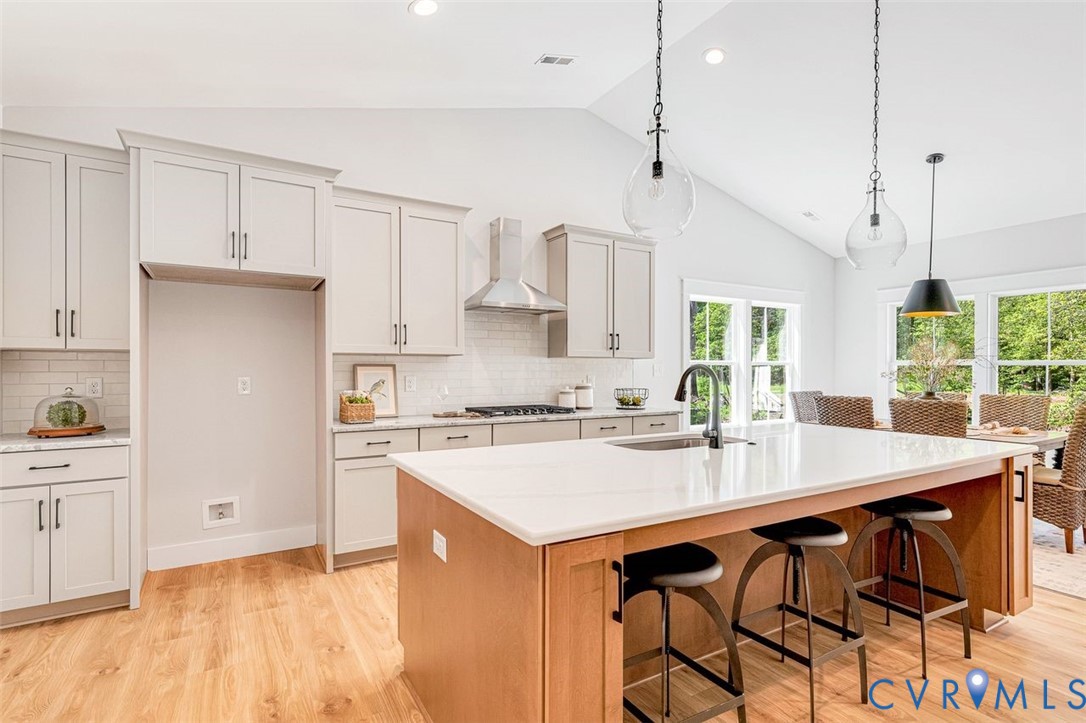 Lot 14 Red Oak Circle, Unit LOT 14 Aylett, VA 23009 - Photo 11 of 27 Kitchen featuring light wood-style floors, hanging