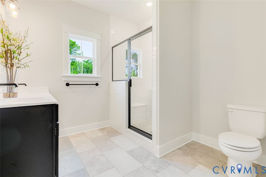 Lot 14 Red Oak Circle, Unit LOT 14 Aylett, VA 23009 - Photo 25 of 27 Full bathroom featuring double vanity, a stall sho