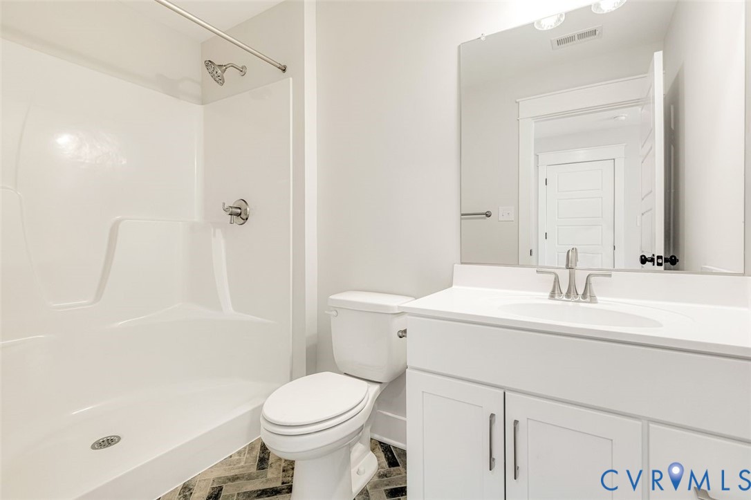 Lot 14 Red Oak Circle, Unit LOT 14 Aylett, VA 23009 - Photo 26 of 27 Bathroom with vanity and a shower