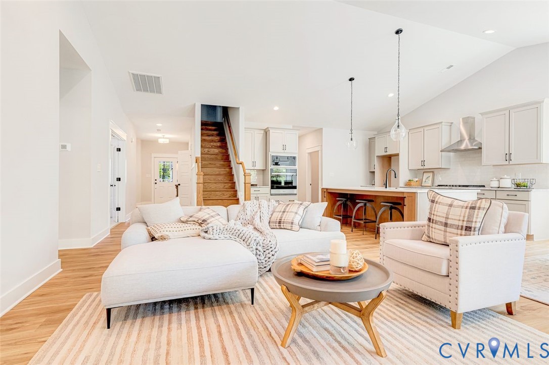 Lot 14 Red Oak Circle, Unit LOT 14 Aylett, VA 23009 - Photo 5 of 27 Living room with light wood-style floors, stairway