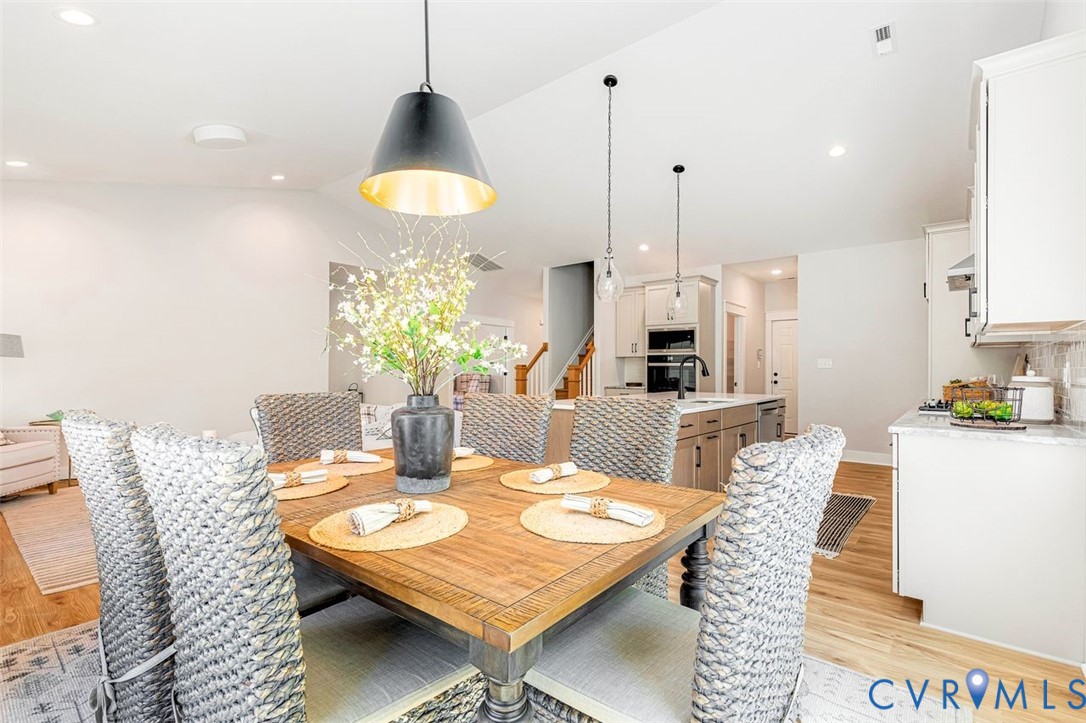 Lot 14 Red Oak Circle, Unit LOT 14 Aylett, VA 23009 - Photo 6 of 27 Dining space with light wood-style flooring, stair