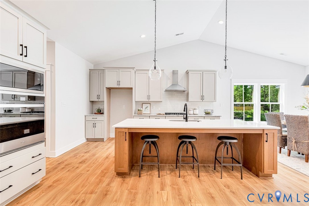 Lot 14 Red Oak Circle, Unit LOT 14 Aylett, VA 23009 - Photo 9 of 27 Kitchen with backsplash, a kitchen breakfast bar,