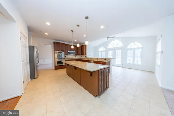 a view of empty room with windows