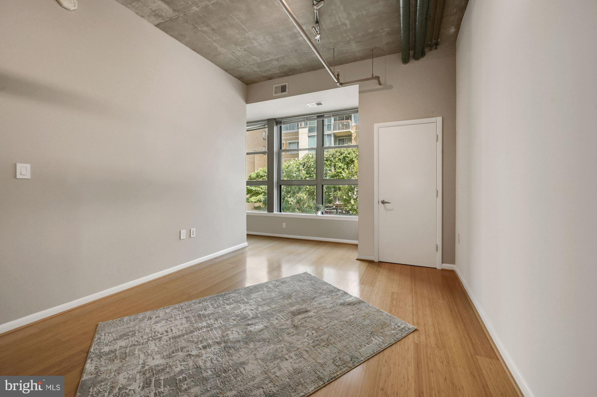 1300 N Street Northwest, Unit 218 Washington, DC 20005 - Photo 7 of 30 Living - Dining area