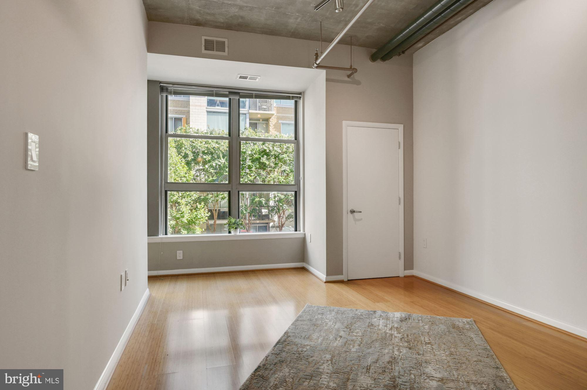 1300 N Street Northwest, Unit 218 Washington, DC 20005 - Photo 9 of 30 Living - Dining area