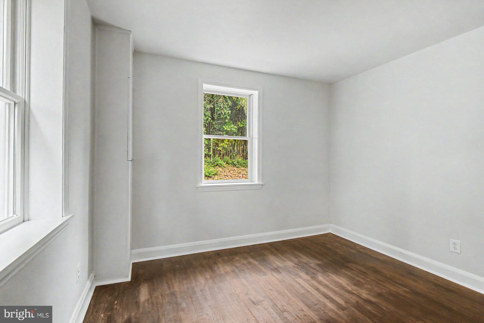 604 Prospect Mill Road Bel Air, MD 21015 - Photo 26 of 36 an empty room with wooden floor and windows