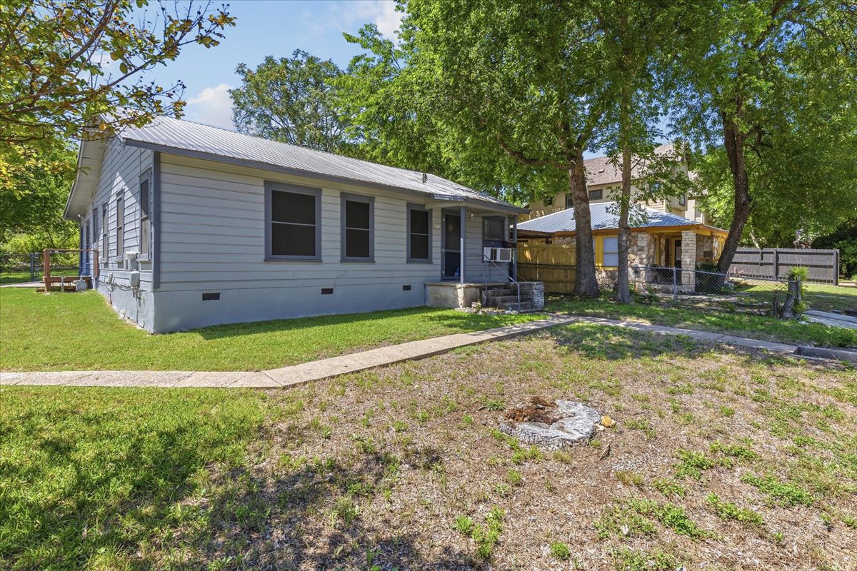 4900 Duval Street Austin, TX 78751 - Photo 3 of 25 Rare corner-lot opportunity in Central Austin’s 78751 with alley access and strong redevelopment potential. Existing 1953 home offers a flexible footprint and sits in a highly connected location near Hyde Park, North Loop, UT, and Downtown Austin.