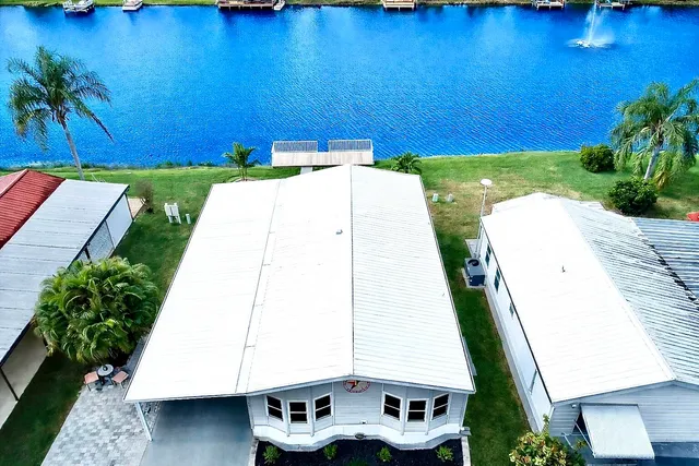a view of a house with a swimming pool