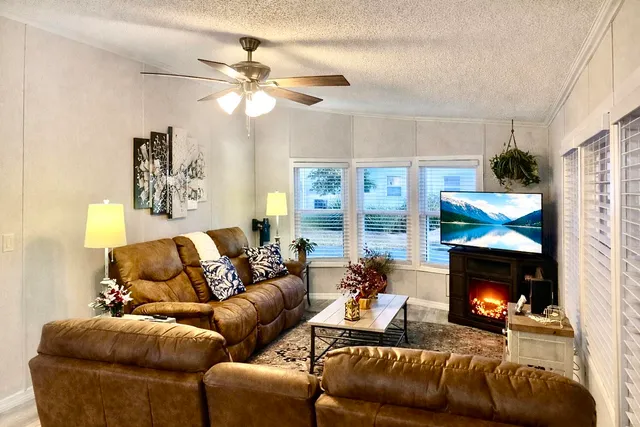 a kitchen with a dining table and chairs