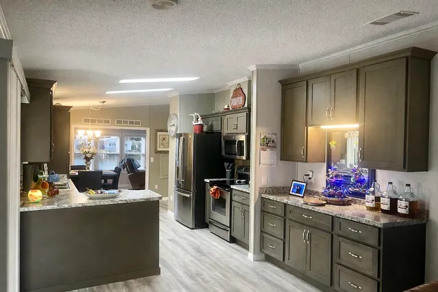 a living room with furniture and a table