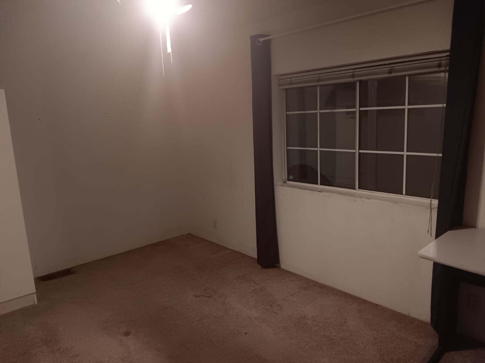 10001 West Frontage Road South Gate, CA 90280 - Photo 18 of 34 a view of empty room with wooden floor and windows