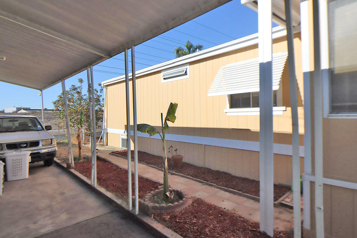10001 West Frontage Road South Gate, CA 90280 - Photo 22 of 34 a view of living room kitchen and floor to ceiling window