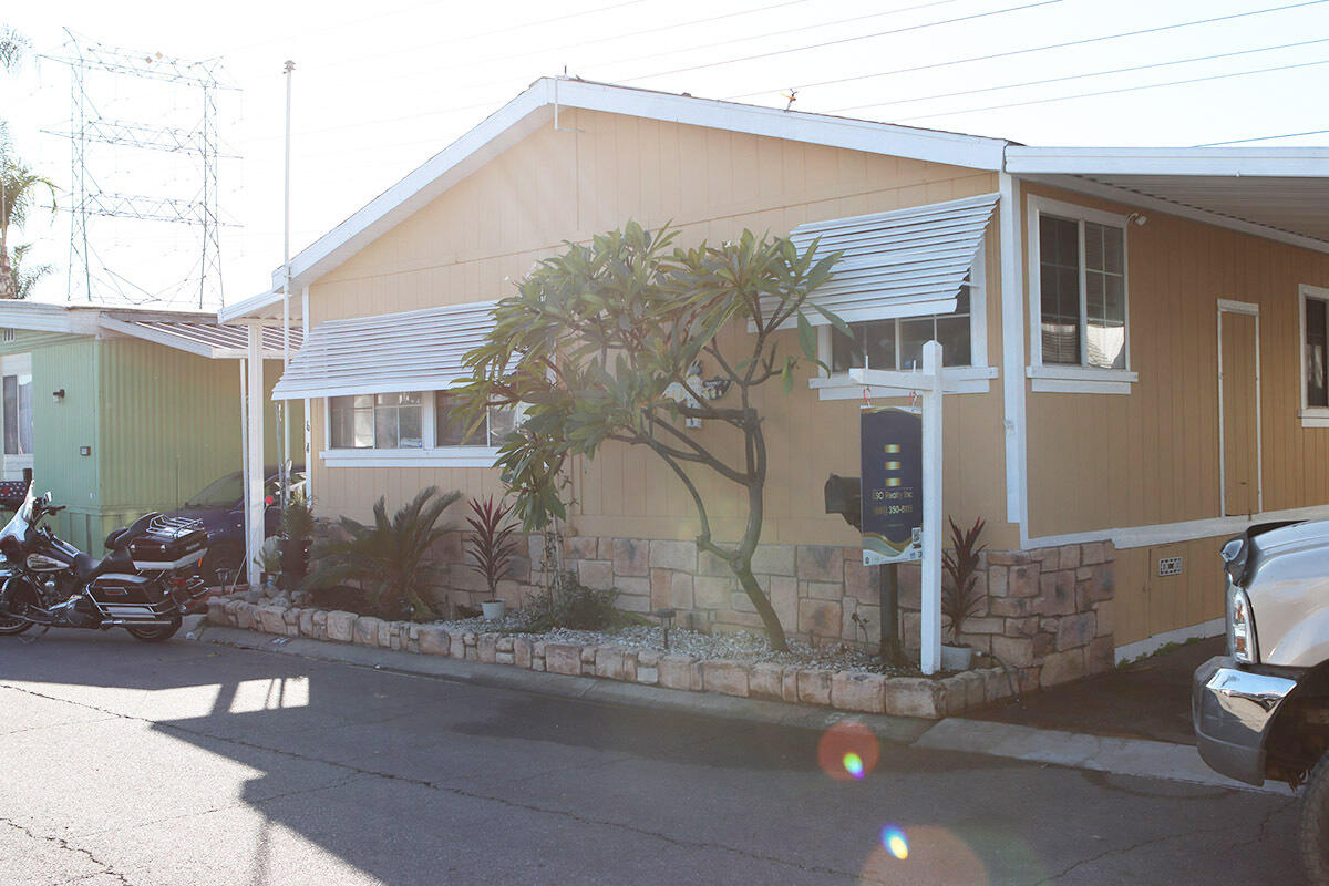 10001 West Frontage Road South Gate, CA 90280 - Photo 29 of 34 a front view of a house with a yard