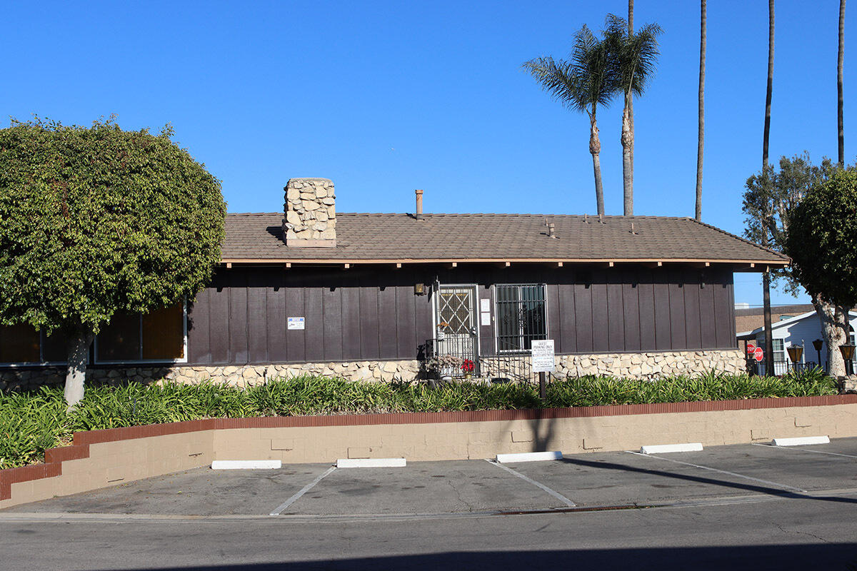 10001 West Frontage Road South Gate, CA 90280 - Photo 34 of 34 front view of a house with a small yard