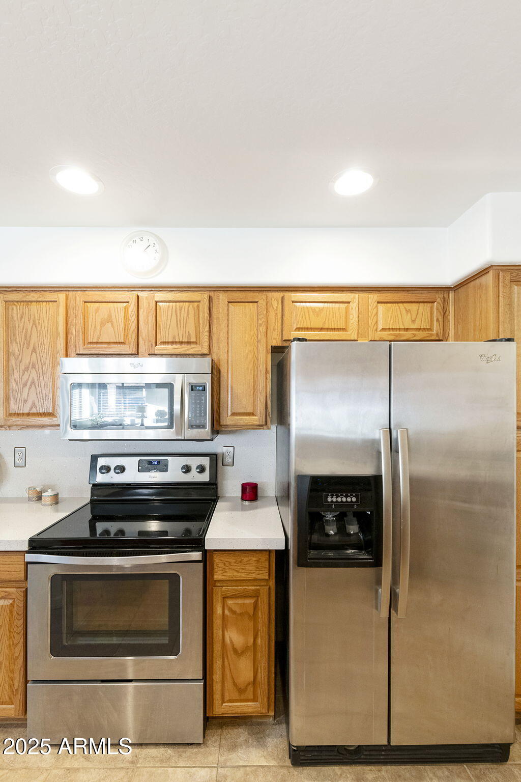 4202 East Broadway Road, Unit 223 Mesa, AZ 85206 - Photo 11 of 56 a kitchen with a stove and a microwave