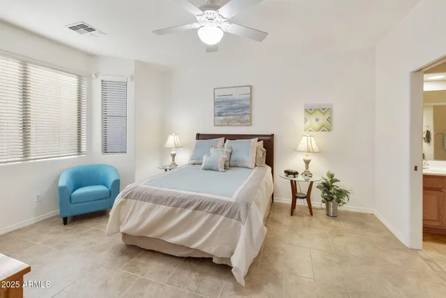 a kitchen with stainless steel appliances a sink stove and cabinets