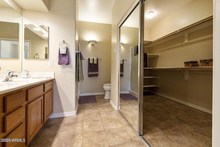 4202 East Broadway Road, Unit 223 Mesa, AZ 85206 - Photo 18 of 56 a bathroom with a sink and a mirror