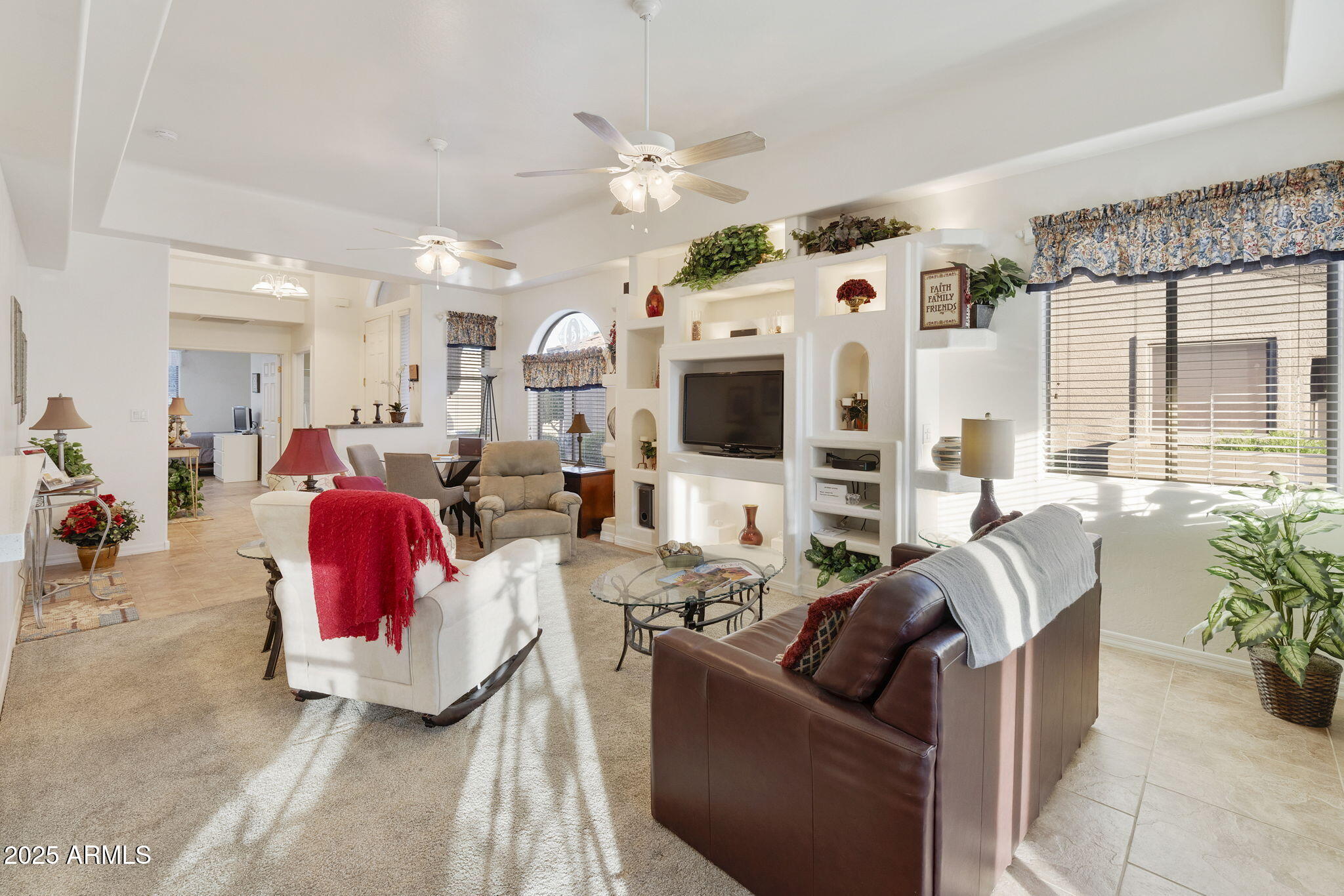 4202 East Broadway Road, Unit 223 Mesa, AZ 85206 - Photo 2 of 56 a living room with furniture and a flat screen tv