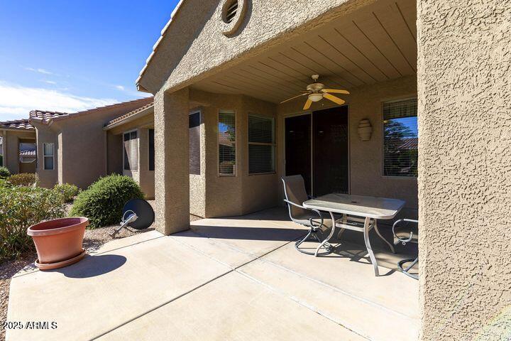 4202 East Broadway Road, Unit 223 Mesa, AZ 85206 - Photo 37 of 56 a view of a chairs and table in a patio
