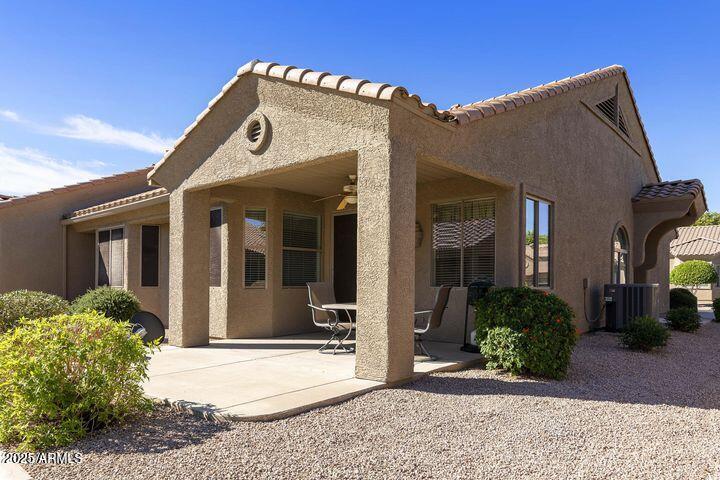 4202 East Broadway Road, Unit 223 Mesa, AZ 85206 - Photo 38 of 56 a view of a brick house with potted plants