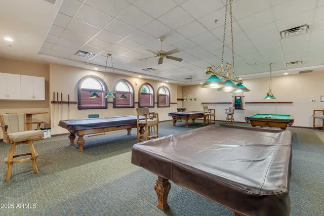 an aerial view of a house with a ocean view