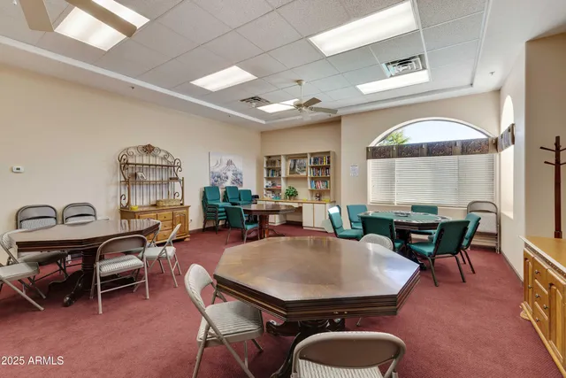 a view of a swimming pool with a lounge chairs