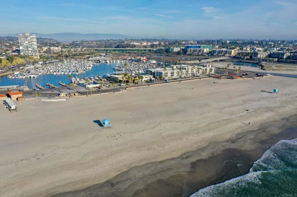 1202 North Pacific Street, Unit 101B Oceanside, CA 92054 - Photo 40 of 48 an aerial view of a beach