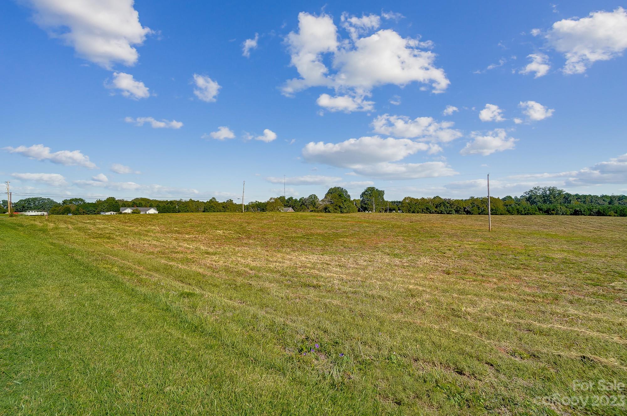 Lot 1 Woolie Road Lincolnton, NC 28092 - Photo 11 of 25 a view of a lake and sunset