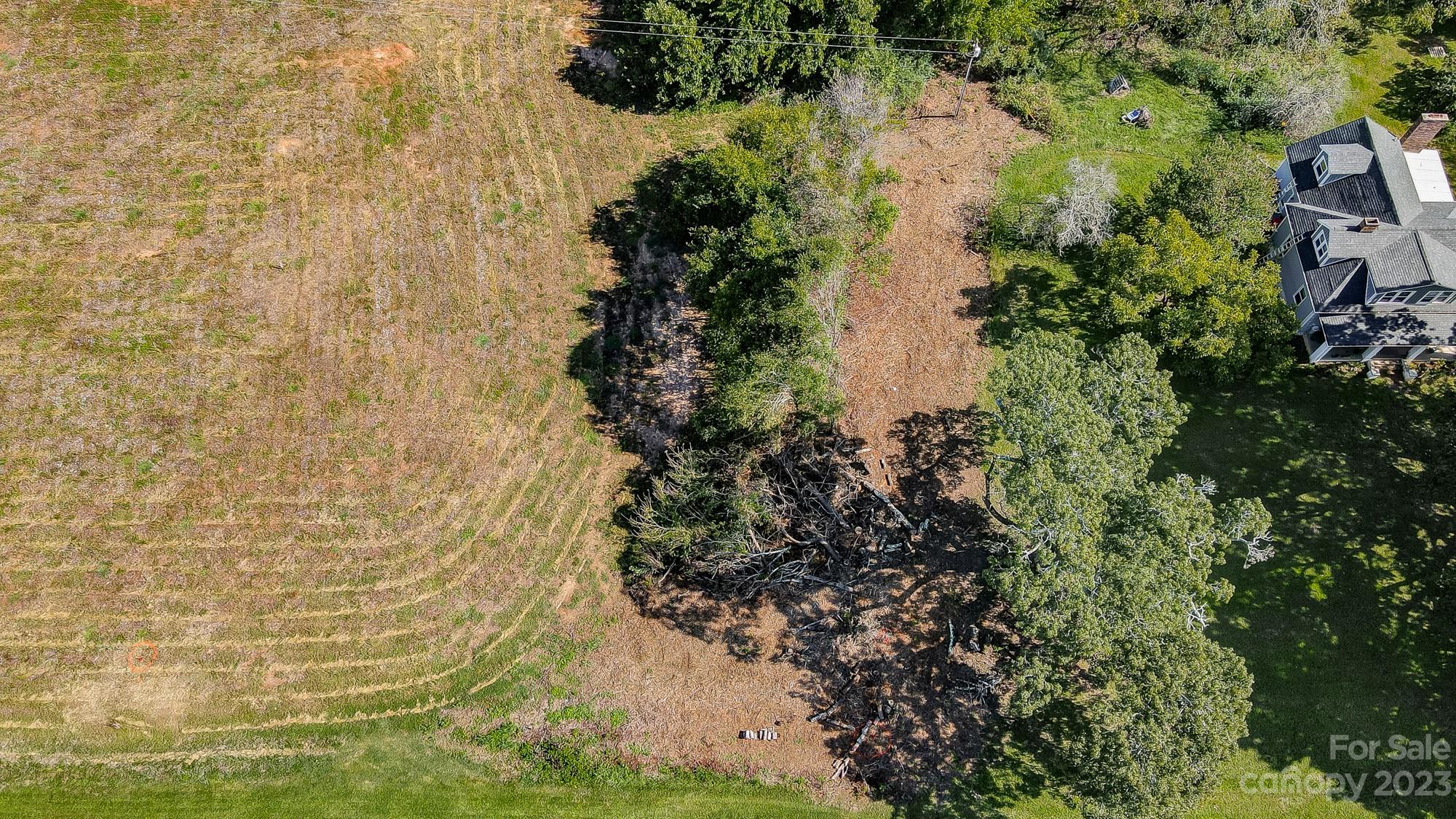Lot 1 Woolie Road Lincolnton, NC 28092 - Photo 21 of 25 a view of a lake with a garden