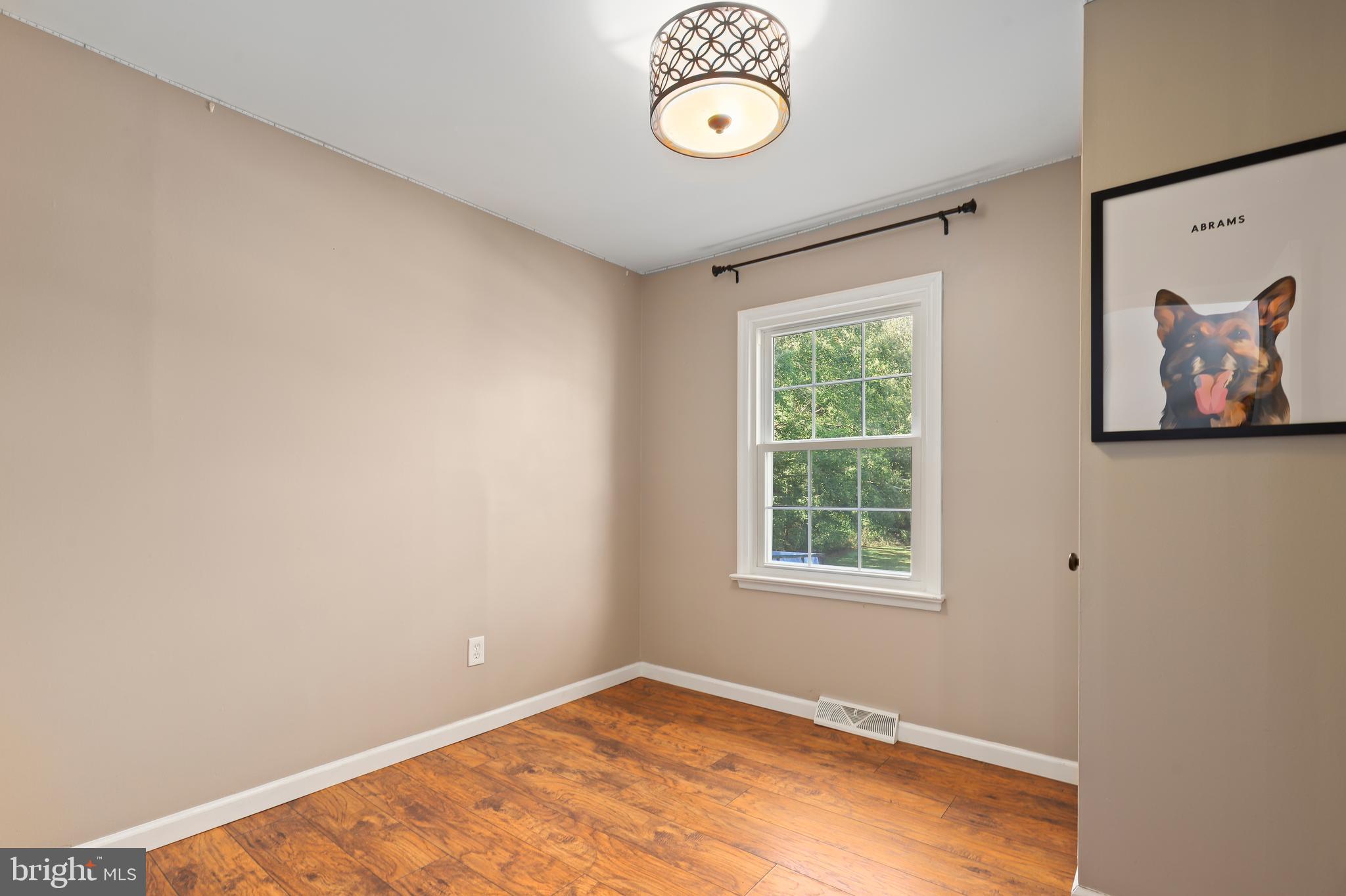 9422 Brentsville Road Manassas, VA 20112 - Photo 25 of 37 an empty room with a window